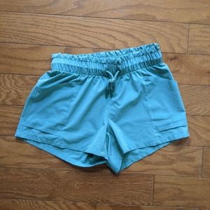 Athleta Girl Small 7 Teal Hiking Athletic Shorts with Pockets Drawstring Solid